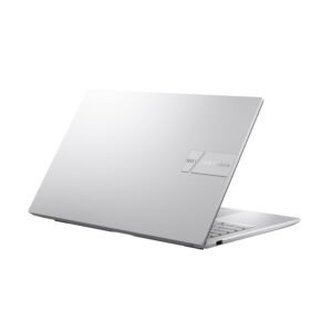Person working on the ASUS Vivobook 15 X1504VA-NJ540WS in a bright, modern setting, emphasizing its portability and ease of use for daily tasks." (Adjust details like "bright, modern setting" based on the actual image)