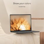 Zenbook A14 in executive workspace with wireless peripherals, showcasing premium productivity