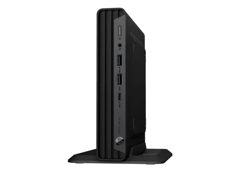 HP Pro Mini 400 G9 C1UE5AT ultra-small form factor next to a monitor.