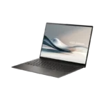 ASUS Zenbook S 14 OLED UX5406SA dark gray laptop open at angle showing slim bezels and abstract wallpaper on screen