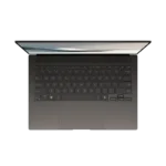 ASUS Zenbook S 14 OLED UX5406SA laptop top-down view showing full keyboard layout and touchpad in dark gray finish