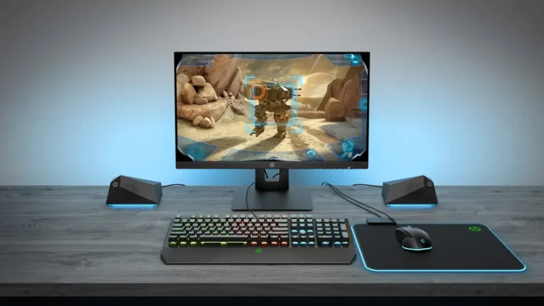 HP gaming setup featuring an HP monitor, mechanical keyboard, gaming mouse, and speakers on a desk at YourShoppy.com.