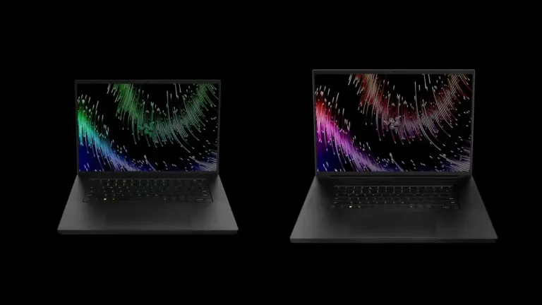 Two Razer Blade gaming laptops in black displayed side-by-side with illuminated screens at YourShoppy.com in Koramangala.