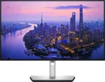 Dell UltraSharp 27 4K Thunderbolt Hub Monitor U2725QE displaying a vibrant city skyline at dusk.