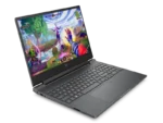 HP Victus 15-fa2495TX silver gaming laptop with 15.6" FHD screen displaying a vibrant game.