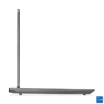 Side view of a sleek grey Lenovo LOQ 15 gaming laptop with Intel Core i7 branding.