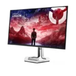 Lenovo Legion Pro 27Q-10 monitor with a vibrant gaming wallpaper and a sleek white stand.