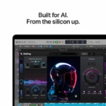 Apple MacBook Pro 14-inch M5 laptop in silver displaying audio software with astronaut graphic.