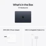 Apple MacBook Air 13-inch in Midnight with 30W USB-C power adapter and USB-C to MagSafe 3 cable.
