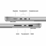 Close-up of silver MacBook Pro ports: MagSafe, Thunderbolt 5, headphone jack, SDXC, and HDMI.