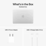 Apple MacBook Neo 13-inch with USB-C power adapter and charge cable.