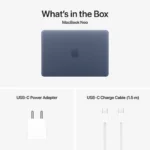 Apple MacBook Neo in Indigo with USB-C power adapter and charge cable.