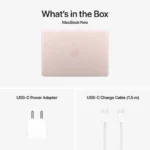 Apple MacBook Neo 13-inch in Blush with USB-C power adapter and charge cable.