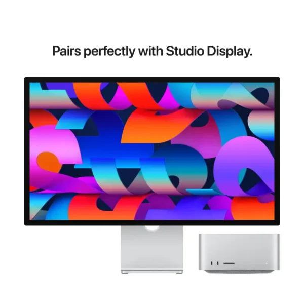 Apple Mac Studio M3 Ultra desktop with Studio Display and colorful wallpaper.