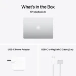 13-inch MacBook Air in silver with USB-C power adapter and MagSafe 3 cable.