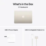 Apple MacBook Air 13-inch M4 in Starlight, with USB-C power adapter and MagSafe 3 cable.