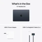 Apple MacBook Air 13-inch M4 Midnight laptop with USB-C power adapter and MagSafe 3 cable.