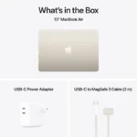 15-inch MacBook Air in Starlight with USB-C power adapter and MagSafe 3 cable.