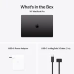 Apple MacBook Pro 16-inch M4 Max in Space Black, with USB-C power adapter and MagSafe 3 cable.