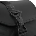 Close-up of black Asus ROG Slash Sling Bag 4.0 with magnetic Fidlock buckle and branded strap.