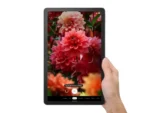 Lenovo Tab M10 5G tablet in Abyss Blue displaying Google Lens identifying flowers.