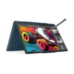 Lenovo Yoga 7 2-in-1 laptop with stylus and vibrant digital art on screen.