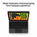 Apple iPad Air 11-inch (M4) 1TB in Space Grey attached to a Magic Keyboard with trackpad, available at YourShoppy.com.