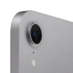 Close-up of the rear camera lens and microphone on the Space Grey Apple iPad mini (A17 Pro) at YourShoppy.com.