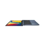 Asus Vivobook 15 X1504VAP laptop in Quiet Blue shown at low angle with colourful display screen open and keyboard visible