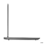 Side profile of the Lenovo LOQ 15AHP10 – 83JG008JIN laptop in Luna Grey, showcasing its sleek design at YourShoppy.com.