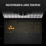 Top-down view of the backlit RGB keyboard and large touchpad on an Asus TUF Gaming F16 FX610JH-TU080WS gaming laptop.