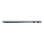 Side view of light blue ASUS Vivobook S16 S5608QA-U3412WS laptop showing USB ports and sleek chassis design at YourShoppy.com