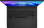 Top-down view of the MSI Prestige 14 AI Evo C1MG-058IN laptop in Stellar Gray with a backlit keyboard at YourShoppy.com.