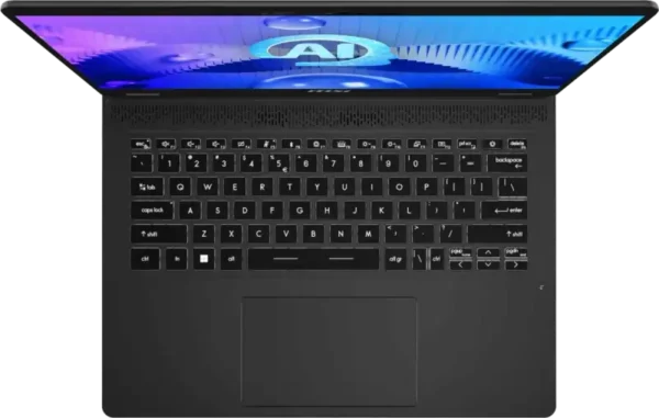 Top-down view of the MSI Prestige 14 AI Evo C1MG-058IN laptop in Stellar Gray with a backlit keyboard at YourShoppy.com.