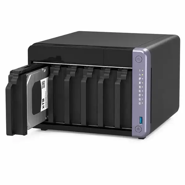 QNAP TS-632X-4G 6-bay tower NAS with one hard drive bay open, featuring a sleek black finish and front-panel status indicator