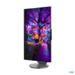 Lenovo Yoga AIO 27IAH10 desktop featuring a 27-inch QHD display in a vertical orientation on a sleek circular silver stand.