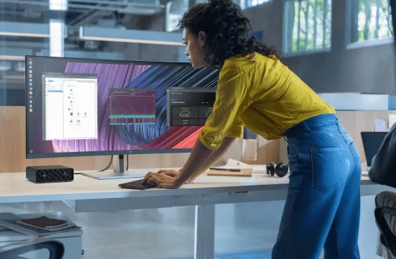 Developer working with HP ZGX Nano AI Station at a desk