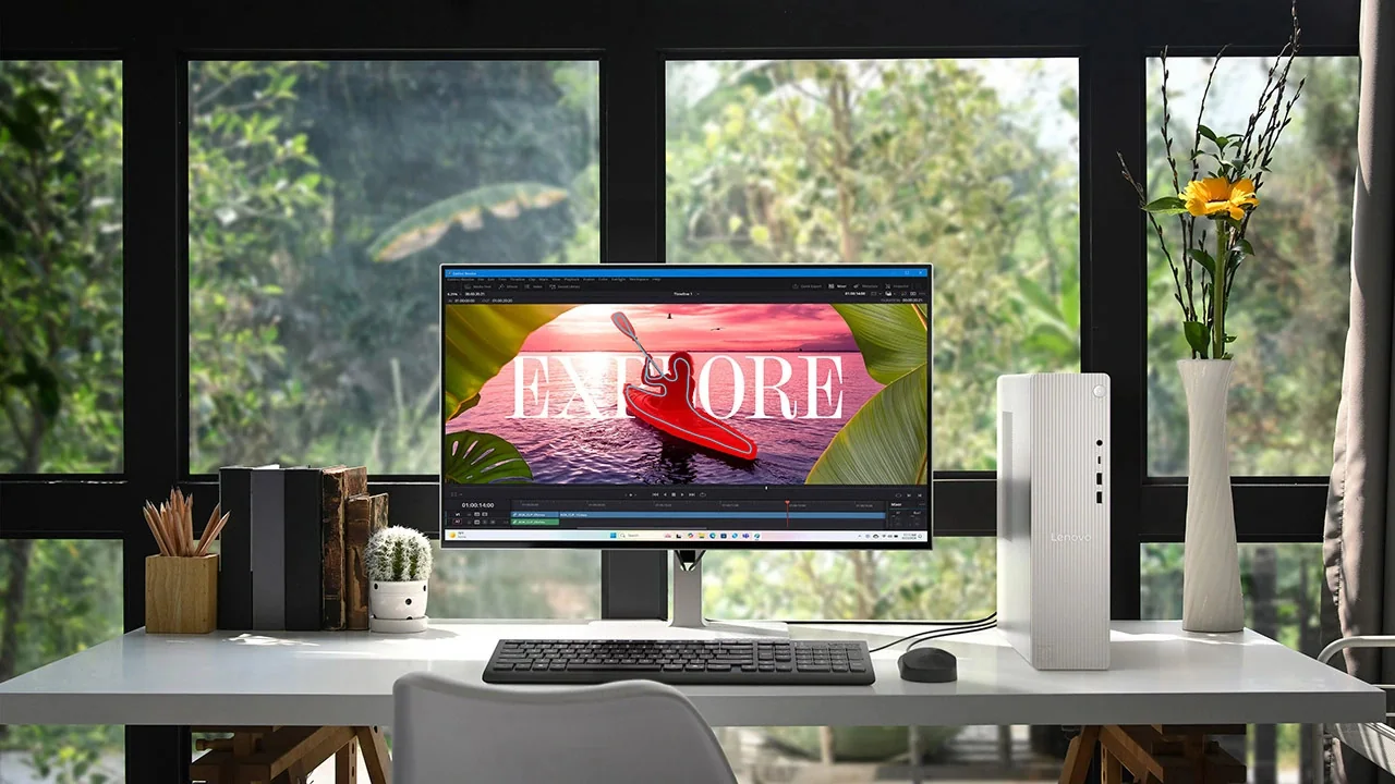 Lenovo IdeaCentre Tower desktop on a home desk next to a monitor